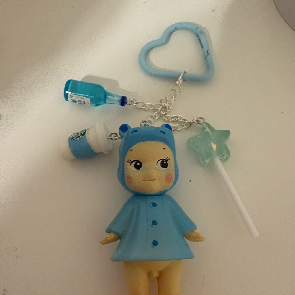 Charming Blue Doll Keychain with Star and Drink Charms